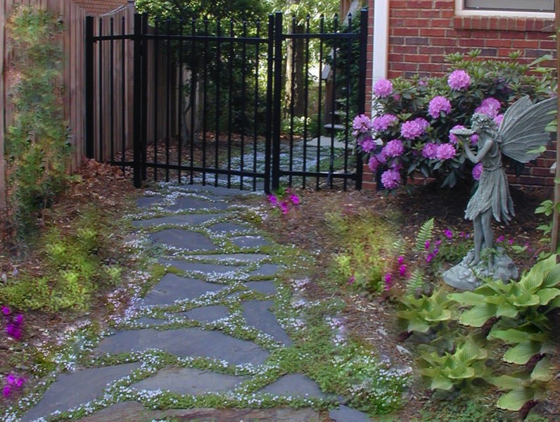 Shady side garden iron gate